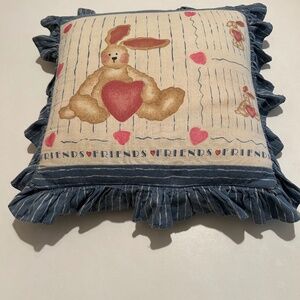 Bunny Pillow that says Friends with hearts
